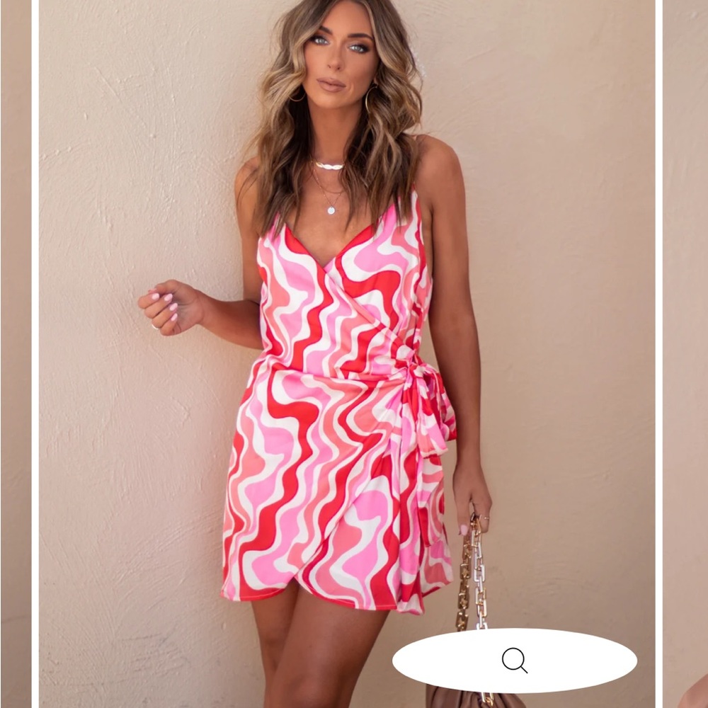 NEW; never worn. VICI mini pink wrap dress